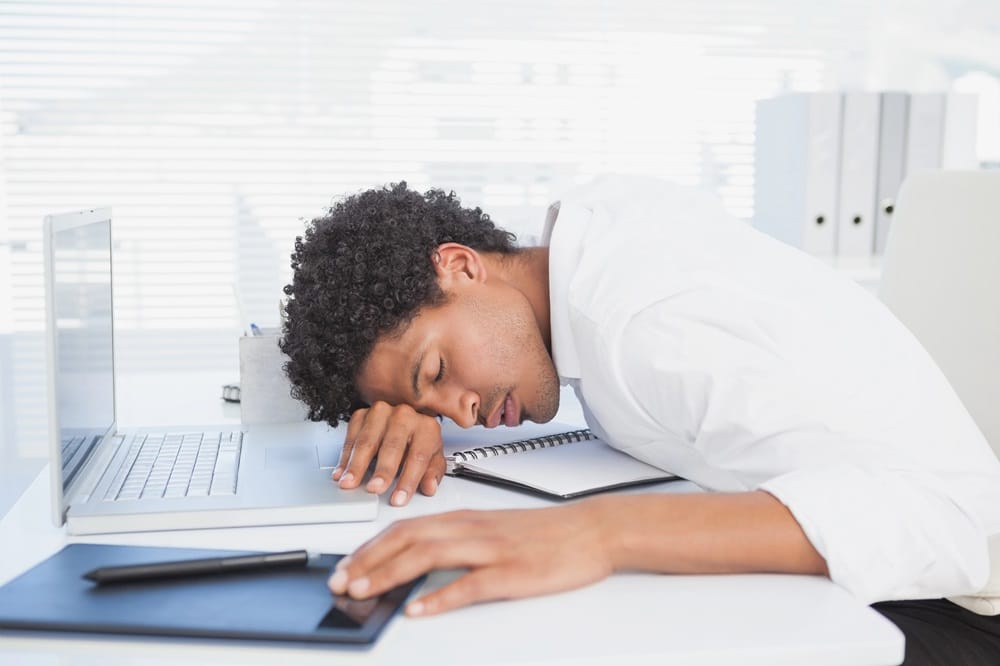 Man asleep at desk